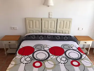 Cama o camas de una habitación en EL DUENDE
