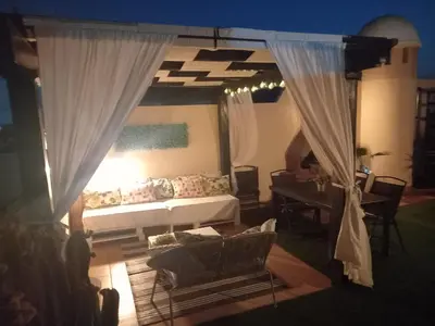 Zona de estar de Atico con piscina privada