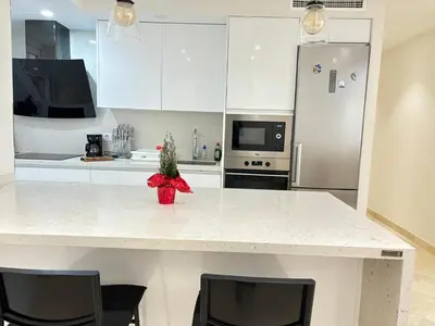 Una cocina o zona de cocina en Rentaly Holidays Apartamento Playa Almeria