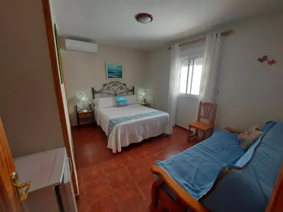 Cama o camas de una habitación en Hostal Costa Rica