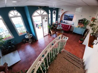 Una televisión o centro de entretenimiento en Hostal Costa Rica