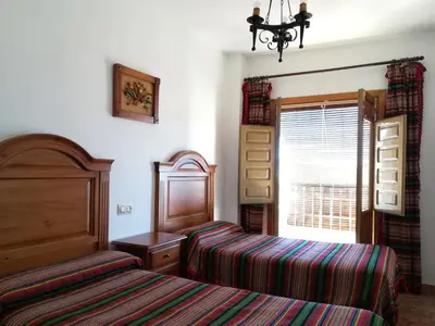 Cama o camas de una habitación en Alojamientos Rurales Las Eras