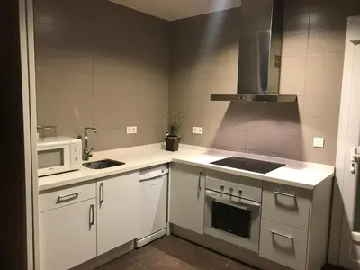 Una cocina o zona de cocina en Fercamar Costacabana