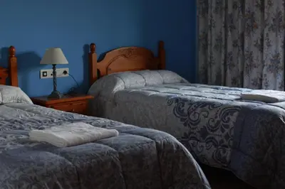 Cama o camas de una habitación en Hospedería Ancladero