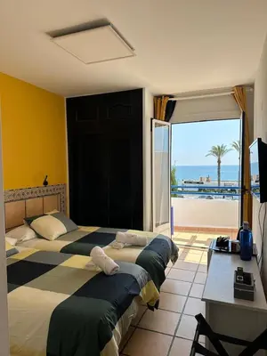 Cama o camas de una habitación en SS Habitaciones turísticas VISTAS AL MAR