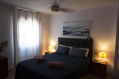 Cama o camas de una habitación en Casa Indalina apartamento con parking privado incluido