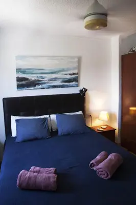 Cama o camas de una habitación en Casa Indalina apartamento con parking privado incluido