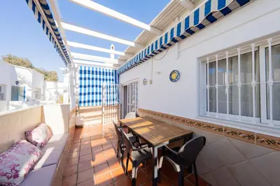 Un balcón o terraza de Apartamento Cala Higuera 80m2