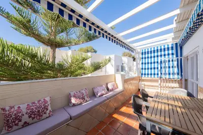 Un balcón o terraza de Apartamento Cala Higuera 80m2