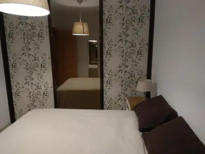Cama o camas de una habitación en Almeria Home Experience