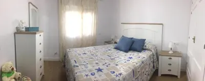 Cama o camas de una habitación en PRECIOSA CASITA JUNTO AL MAR