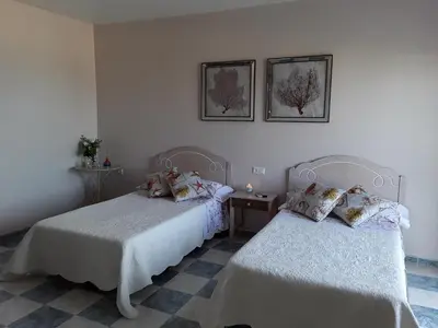 Cama o camas de una habitación en pension hernandez