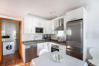 Una cocina o zona de cocina en CASA BLANCA Apartments SAN JOSE