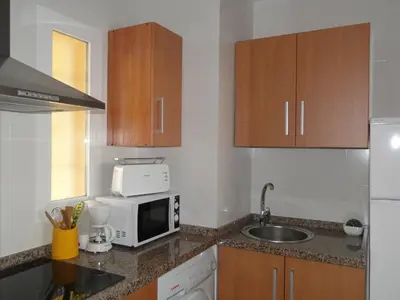 Una cocina o zona de cocina en APARTAMENTOS MAR Y GOLF