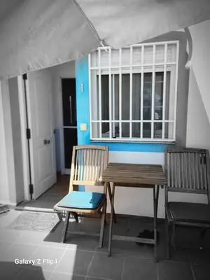Un balcón o terraza de Villa Rocio, 1ª línea playa y Parque Natural - planta baja