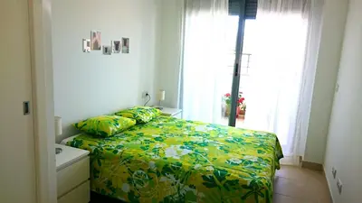 Cama o camas de una habitación en Apartamento de dos dormitorios junto a Mojácar Playa