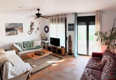 Una televisión o centro de entretenimiento en Casa Indalo - Resort Macenas Mojacar