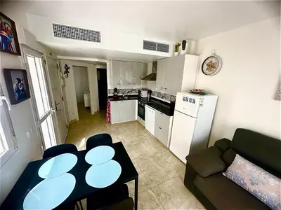 Una cocina o zona de cocina en Apartamento DESA Laguna Beach Vera Playa