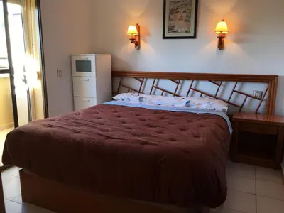 Cama o camas de una habitación en APARTAMENTO CERCA DE LA PLAYA