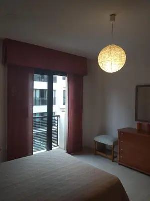 Cama o camas de una habitación en Apartamento 2 hab.en El Parador