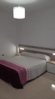 Cama o camas de una habitación en Apartamento 3 Hab. en el Parador