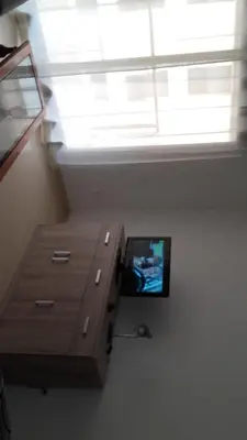 Una televisión o centro de entretenimiento en Apartamento 3 Hab. en el Parador
