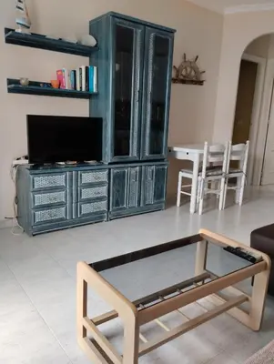 Una televisión o centro de entretenimiento en Vera Natura Apartamento Paula