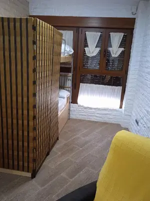 Cama o camas de una habitación en El Cuchitril