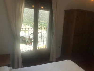 Cama o camas de una habitación en Alojamiento Rural '' Los Ciruelillos''