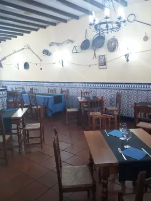 Un restaurante o sitio para comer en La Posada de Eustaquio