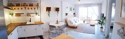 Una cocina o zona de cocina en ROQUETAS BEACH HOUSE Apartamento fresco con Piscina