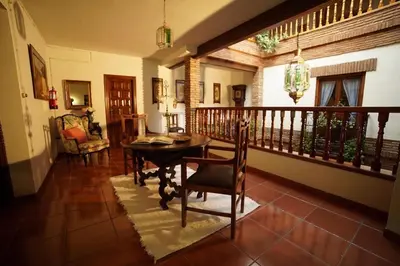 Zona de estar de Palacete Magistral Domínguez habitaciones