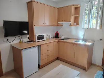 Una cocina o zona de cocina en APARTAMENTO JAZMINERO