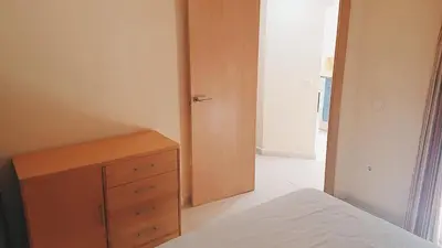 Cama o camas de una habitación en Avenida de Juan Sebastián Elcano Apartamento 1A02