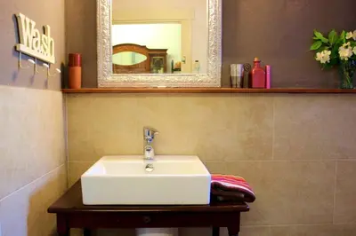 Un baño de El Aljibe Suite Rural