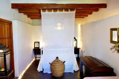 Cama o camas de una habitación en El Aljibe Suite Rural