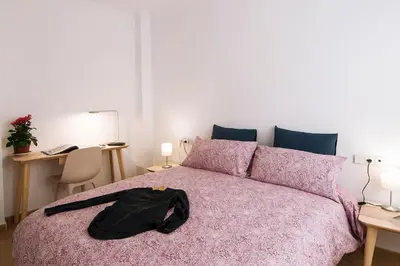 Cama o camas de una habitación en Apartamentos Vida Almería