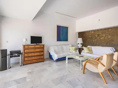 Una televisión o centro de entretenimiento en Holiday Home La Veleta by Interhome