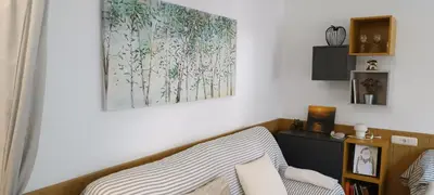 Una televisión o centro de entretenimiento en Apto Blanes - WIFI GRATIS