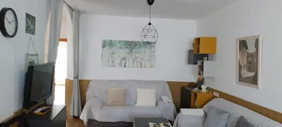 Una televisión o centro de entretenimiento en Apto Blanes - WIFI GRATIS
