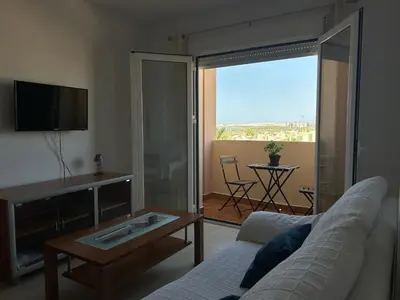 Una televisión o centro de entretenimiento en San Miguel Apartamentos