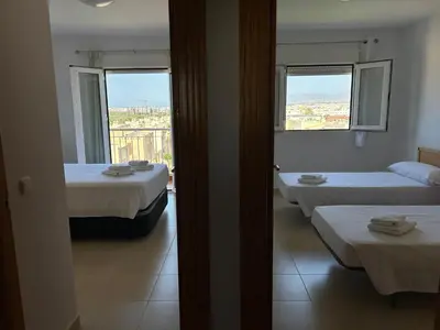 Cama o camas de una habitación en San Miguel Apartamentos
