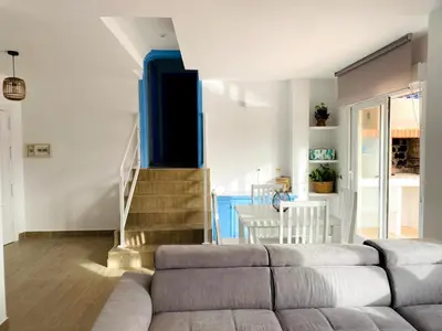 Zona de estar de Apartamentos El Puerto
