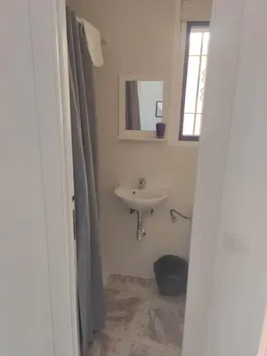 Un baño de Apartamentos El Puerto