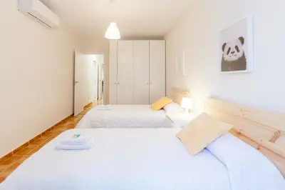 Cama o camas de una habitación en TU DESCANSO