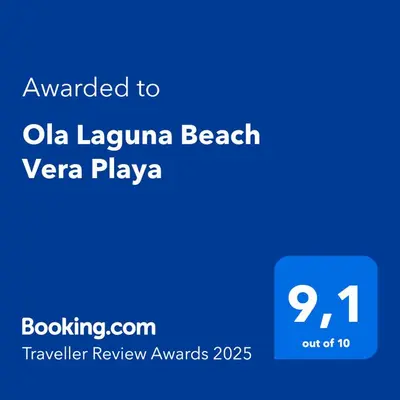 Certificado, premio, señal o documento que está expuesto en Ola Laguna Beach Vera Playa
