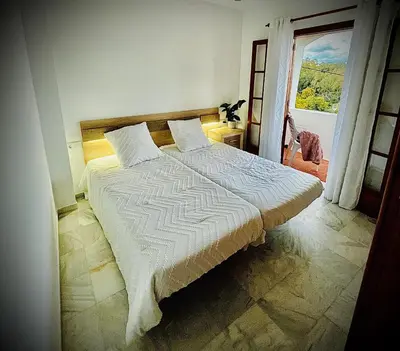 Cama o camas de una habitación en Mojacar Casa El Cantal Playa con vistas la Mar