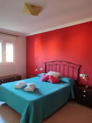 Cama o camas de una habitación en Apartamentos San Miguel 2