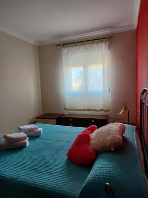 Cama o camas de una habitación en Apartamentos San Miguel 2
