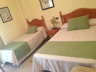 Cama o camas de una habitación en Hotel Venta del Pobre